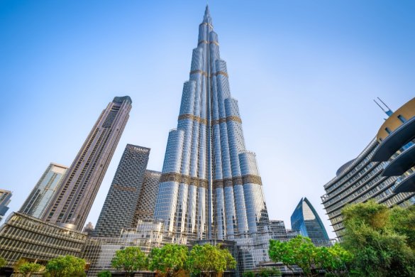 a view looking up from the footpath beneath the Burj Khalifa in Dubai