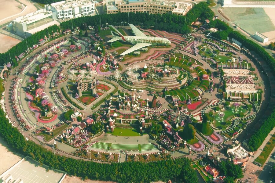aerial view of Dubai Miracle Garden including the floral 1380 emirates plane - depositphotos