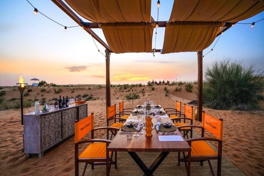 dinner table in the desert dubai arabian adventures event - image supplied